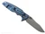 Rick Hinderer Knives Skinny Eklipse Slicer folding knife with flipper tab - shown open - lock side.  Working Finish 3.5" hollow grind MagnaCut stainless steel plain edge blade.  FDE G-10 handle scale with Battle Blue lock side.  Model KEK35SKSLHO
