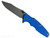 Rick Hinderer Knives Skinny Eklipse Slicer folding knife with flipper tab - shown open - presentation side.  Working Finish 3.5" hollow grind MagnaCut stainless steel plain edge blade.  Blue G-10 handle scale with Working Finish lock side.  Model KEK35SKSLHO