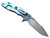 Rick Hinderer Knives XM-18 Skinny Harpoon Spanto with thumb stud and flipper tab - shown open lock side.  Stonewash MagnaCut stainless steel plain edge blade.  Orange G-10 handle with stonewash blue lock side.  Model KXM35SKHS.