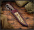 RMJ Tactical Marauder - shown in sheath obverse. Savage Stainless Cerakote 3V steel plain edge blade.  Hyena Brown G-10 handle scales.  Model K-MD-3V-SS-HB-OX/DT.