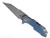 Rick Hinderer Knives Full Track Wharncliffe folding knife with flipper tab - shown open presentation side.  Working Finish S45VN stainless steel plain edge blade.  Battle Blue titanium with blue - black G-10 scales.  Model KFTRWC.