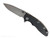 Rick Hinderer Knives XM-18 3.25" Spanto folding knife with thumb stud and flipper tab - shown open presentation side.  Stonewashed MagnaCut stainless steel plain edge blade.  Black G-10 handle with stonewashed bronze lock side.  Model KXM325SPA.