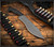RMJ Tactical Sapper fixed blade knife - shown out of sheath obverse.  Tungsten Cerakote 80CRV2 steel plain edge blade.  Black G-10 handle.  Model K-SAP-80CRV2-TU-BK.