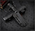RMJ Tactical Sparrow fixed blade knife - shown in sheath reverse.  Graphite Black Cerakote MagnaCut stainless steel plain edge blade.  Black G-10 handle.  Model K-SP-MC-GB-BK.