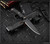 RMJ Tactical Sparrow fixed blade knife - shown out of sheath reverse.  Graphite Black Cerakote MagnaCut stainless steel plain edge blade.  Black G-10 handle.  Model K-SP-MC-GB-BK.