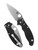 Spyderco Manix 2 folding knife with thumb hole - shown both open presentation side and closed pocket clip side.  MagnaMax stainless steel plain edge blade.  Black G-10 handle.  Model C101GP2.