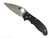Spyderco Manix 2 folding knife with thumb hole - shown open presentation side.  MagnaMax stainless steel plain edge blade.  Black G-10 handle.  Model C101GP2.