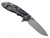 Rick Hinderer Knives XM-18 3.5" Spear Point folding knife with thumb stud and flipper tab - shown open lock side.  Working Finish MagnaCut stainless steel plain edge blade.  Black G-10 handle with Battle Black lock side.  Model KXM35SPEDLC.
