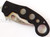 Emerson Knives Super Karambit SF folding knife with thumb hole and Emerson Wave opener - shown closed presentation side.  Satin 154CM stainless steel plain edge blade.  Black G-10 handle.  Model S-KAR-SF.