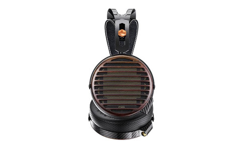 FiiO FT7 Black headphone ear cup, direct rear view, zebrawood grille with horizontal slats, FiiO logo, carbon fiber cup body, perforated lambskin ear pad, white background