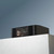 Bluesound Node Icon N530 product render on white geometric podium against blue-gray gradient background