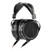 Three-quarter front view of black Audeze LCD-X open-back planar magnetic headphones with leather earpads and braided cable on a white background