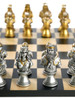 Themed Chess Set: Camelot Gold & Silver Painted Resin Busts on Black & Maple Chess Board close up silver pieces