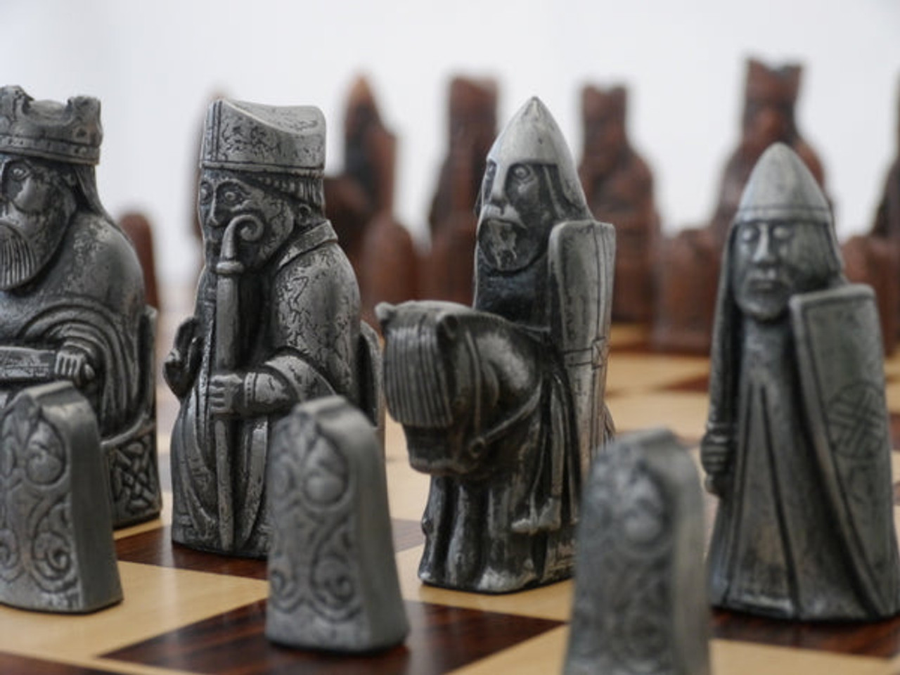 The Metal Isle of Lewis Chess Pieces - Antique Silver & Copper Finish with 3.5" King black pieces up close 