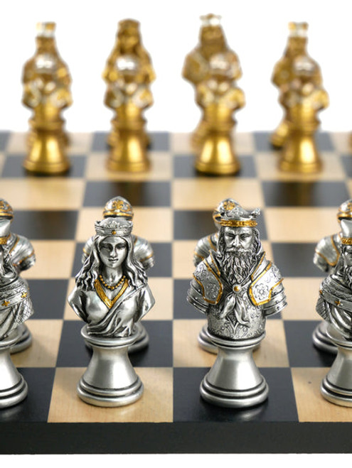 Themed Chess Set: Camelot Gold & Silver Painted Resin Busts on Black & Maple Chess Board close up silver pieces