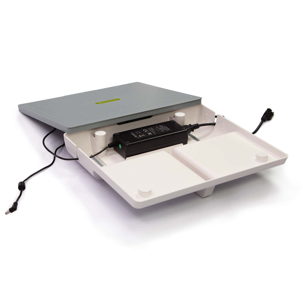 A quilting heat press machine opened to show its inner components.