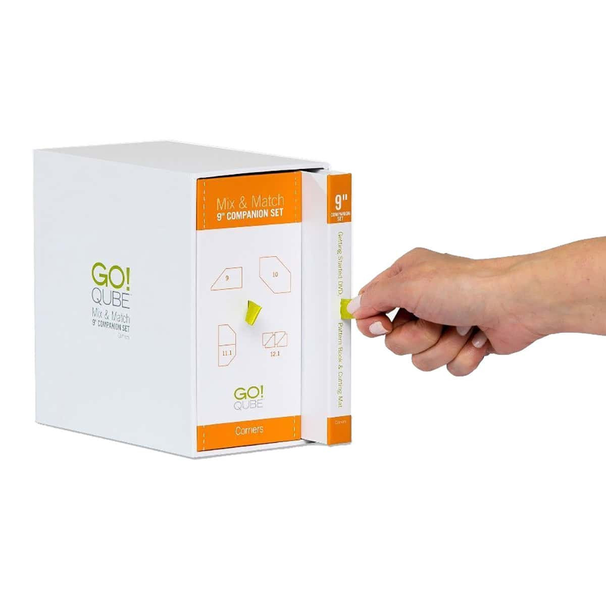 Quilting set being held with a hand showcasing its easy-use design.