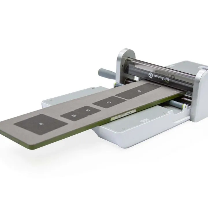 Sewing machine roller with a long patterned fabric piece in West Gosford NSW.