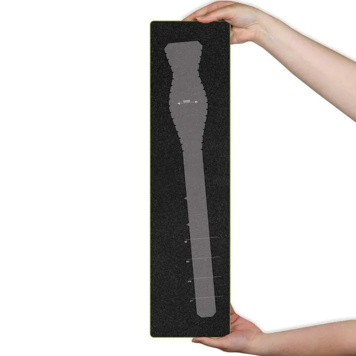 Hands holding a foam packaging insert for sewing accessories in West Gosford NSW.