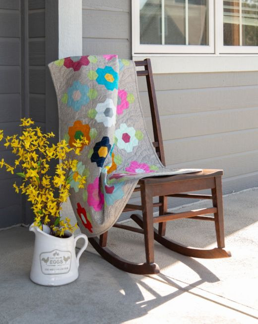 pq11723-hexagon-gardens-throw-lifestyle-web