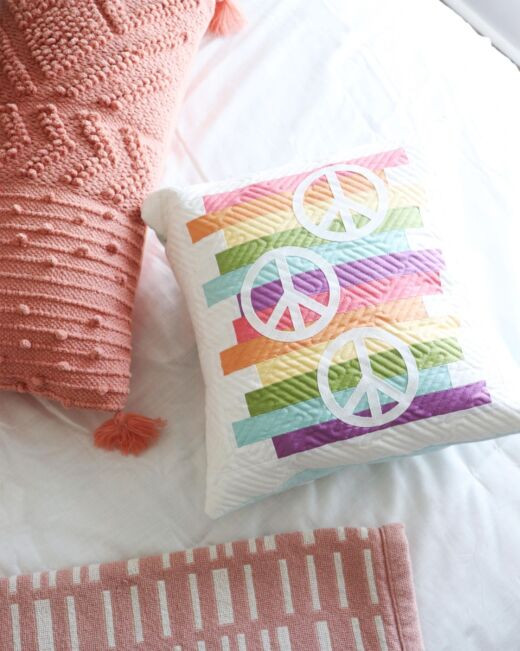 pq12034-rainbow-peace-sign-pillow-lifestyle-web