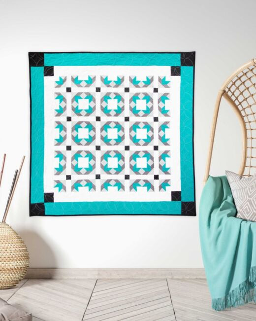 pq12144-geometric-tiles-throw-quilt_lifestyle_web