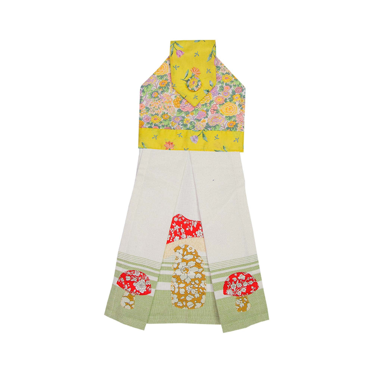 Colorful fabric apron cut and stitched with floral and mushroom patterns.