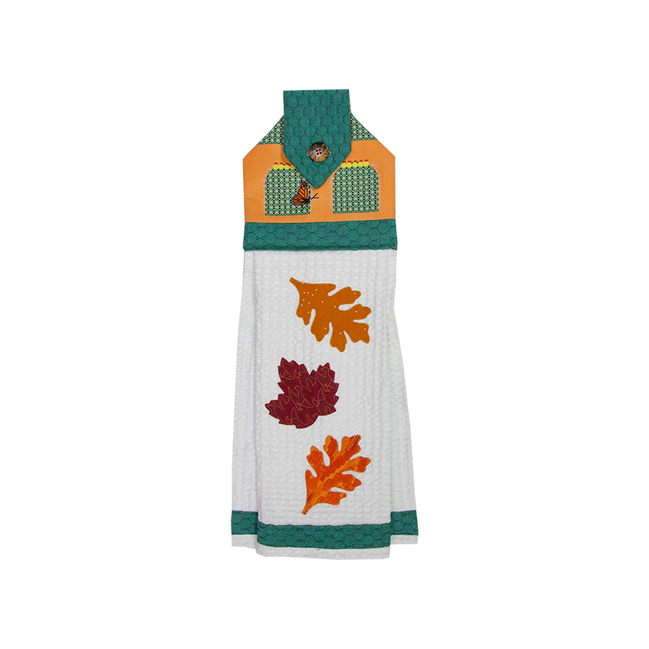 A decorative fabric hanger showcases leaf designs in vibrant autumn colors.