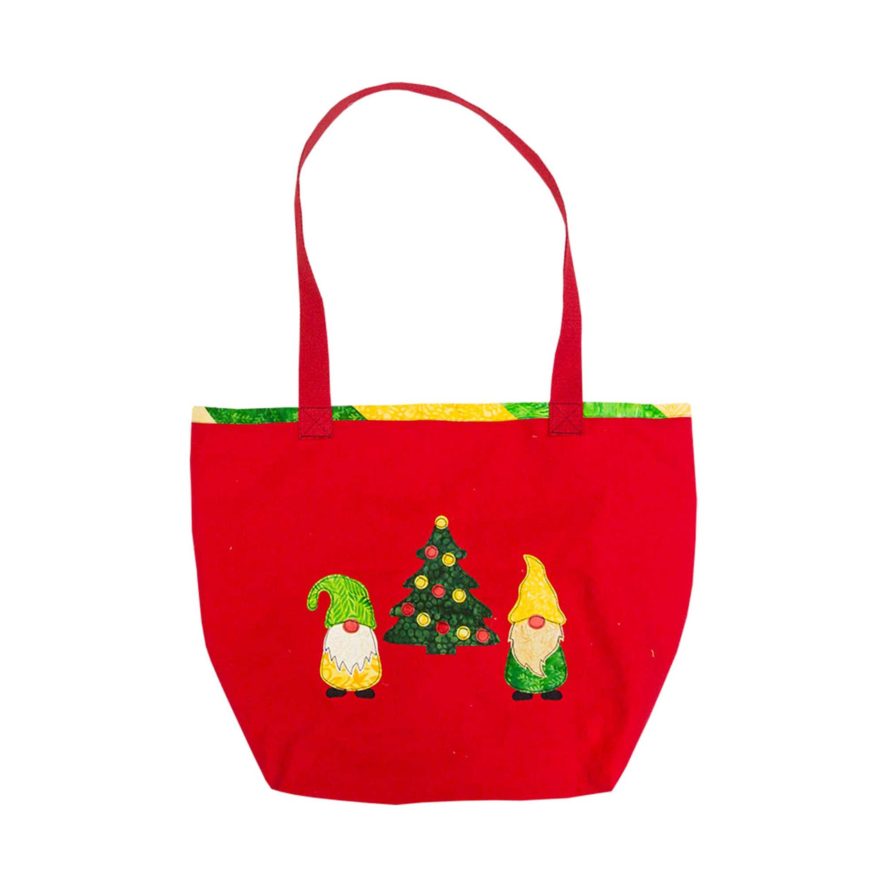 Red fabric bag with festive gnome and Christmas tree designs on the front.
