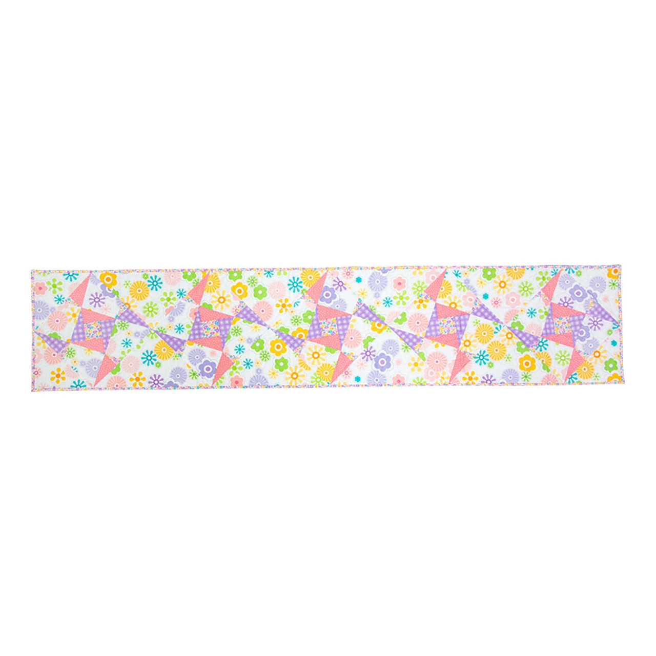Colorful floral quilt with geometric patterns from a New South Wales business.