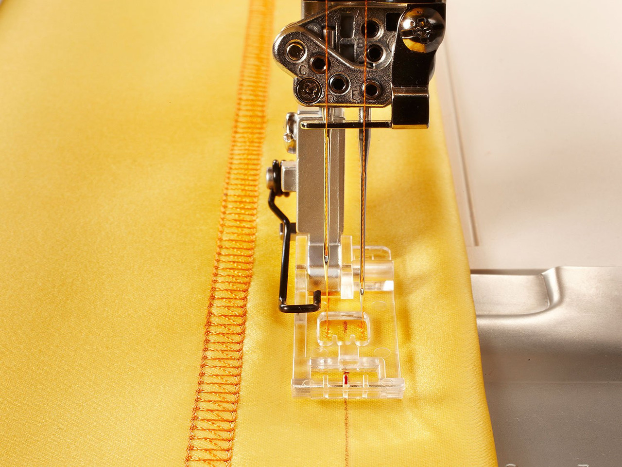 Husqvarna Viking Clear Seam Guide Foot – Helps in creating accurate seams.