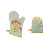 Two oven mitts with colorful mushroom and floral fabric patterns.