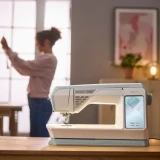 Husqvarna Viking sewing machine in home workspace setting