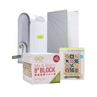 Fabric cutting machine with mix and match block set for quilting.