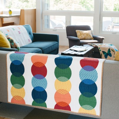 GO! Local Colour Quilt Pattern by Bill Kerr (on lounge)