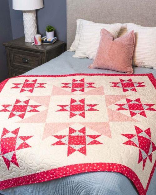 pq11865-qube-12in-stars-in-the-crown-throw-quilt_lifestyle_web