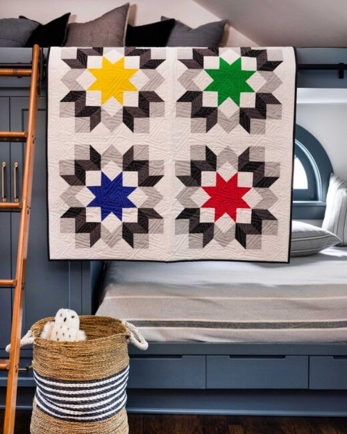 pq11937-tumbling-stars-throw-quilt_lifestyle_web