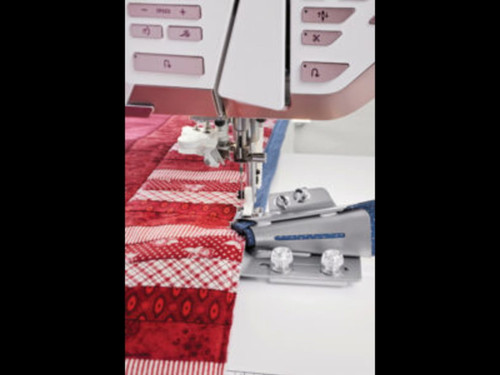 Husqvarna Viking Quilt Binder – Front view showing quilting accessory for binding quilts.