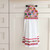 Hanging kitchen towel with colorful cup pattern and decorative border trim.
