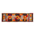Colorful autumn-themed quilt with vibrant leaves and acorns.