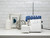 Husqvarna Viking Amber Air S15 overlocker in home sewing room - white and blue serger