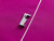 Husqvarna Viking piping foot on magenta fabric - sewing accessory