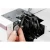 Adjusting settings on a high-end sewing machine for precision stitching.