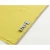 Sewing machine foot on yellow fabric edge highlighting stitching precision.