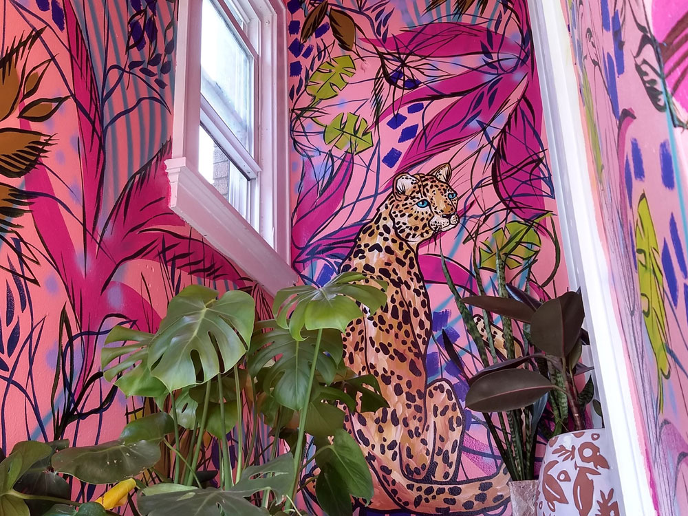 Interior mural turns a stairwell into a jungle