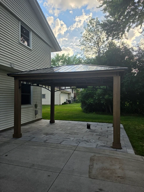 Yardistry 12x14 Wood Gazebo with Aluminum Roof installed by a HandyBuddy expert in Mequon, WI · Jun 2026