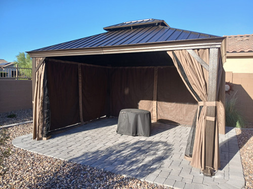 Domi Outdoor Living Hardtop Gazebo Wood-Looking with Drainage Gutters installed by a HandyBuddy expert in Florence, AZ · Jun 2025