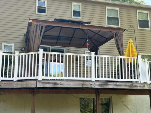 Domi Outdoor Living Hardtop Gazebo Wood-Looking with Drainage Gutters installed by a HandyBuddy expert in Silver Spring, MD · Jul 2024