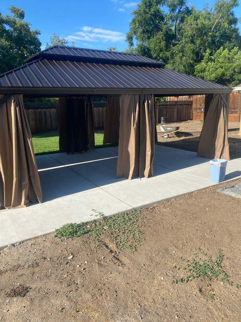 Domi Outdoor Living Hardtop Gazebo Wood-Looking with Drainage Gutters installed by a HandyBuddy expert in San Jose, CA · Jun 2024