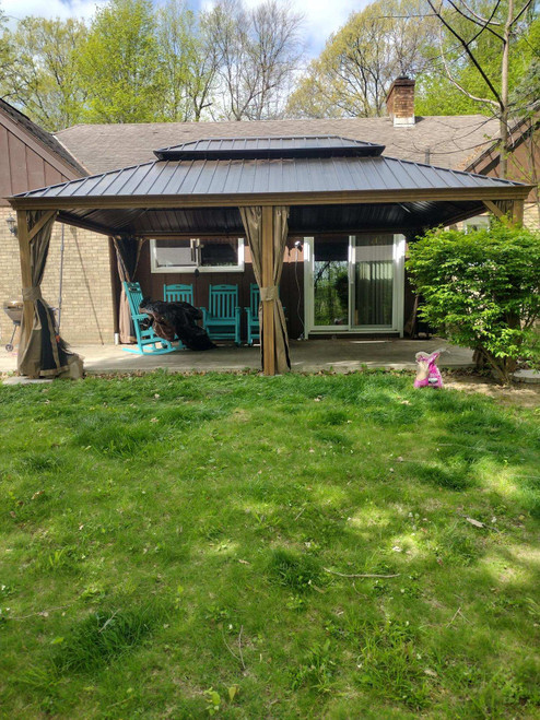 Domi Outdoor Living Hardtop Gazebo Wood-Looking with Drainage Gutters installed by a HandyBuddy expert in Jenera, OH · Apr 2024